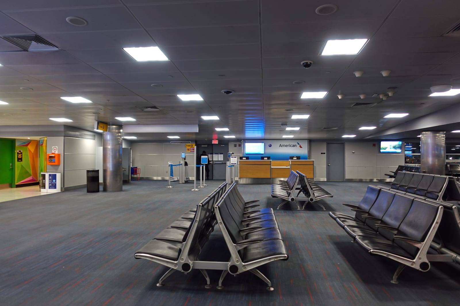 The departure lounge at JFK Terminal 8, with seating in front of the gates