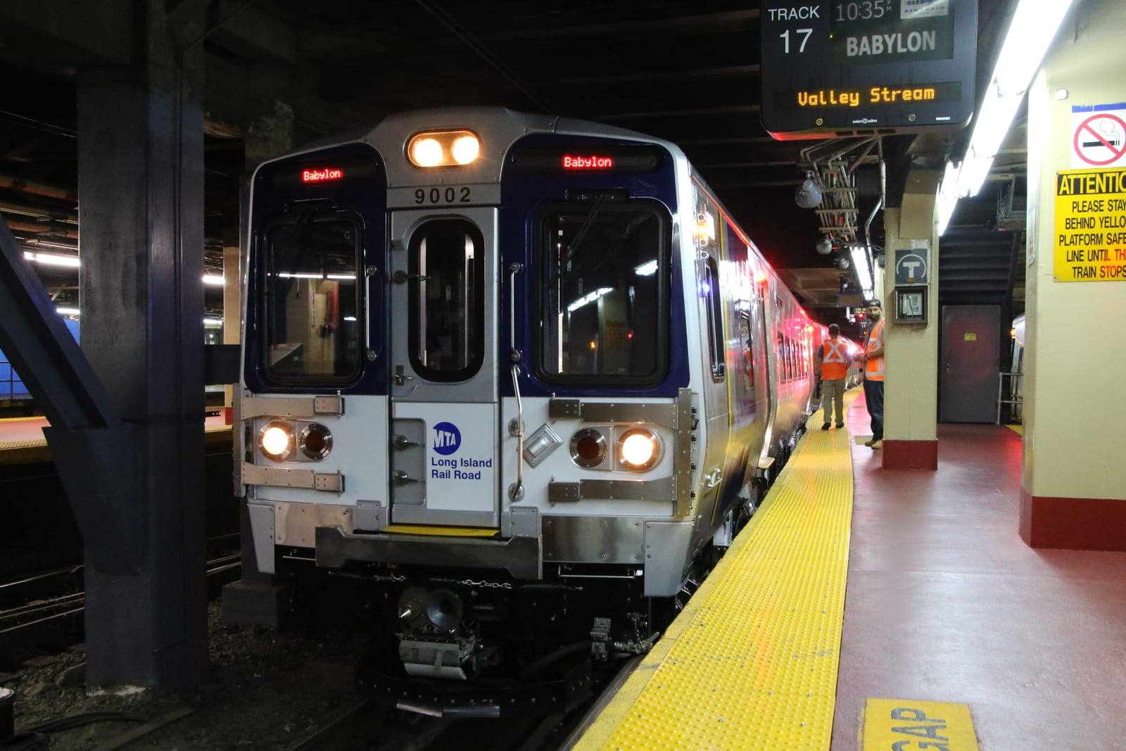 A Long Island Rail Road train of M9 cars at Penn Station, the Manhattan end of the LIRR route from JFK