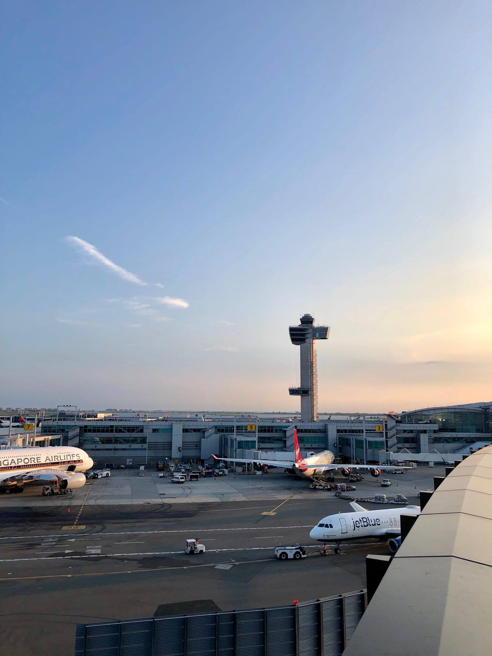 The TWA Flight Center seen from the TWA Hotel pool deck, above the runway apron